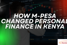 How M-Pesa Changed Personal Finance in Kenya: 19 Years. M-Pesa mobile money transaction on smartphone showing personal finance management in Kenya